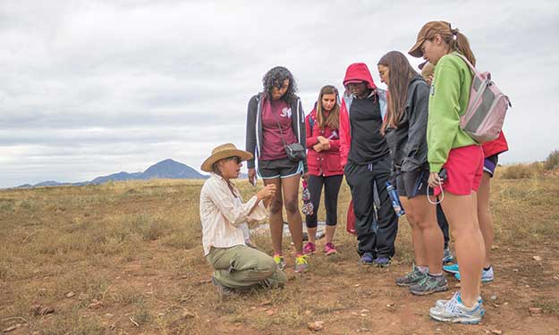 Crow Canyon researchers working with students in the field